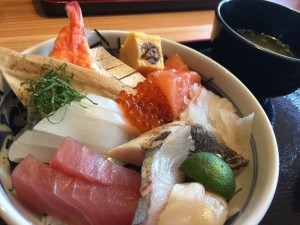 マ